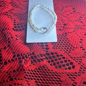 Elegant Pearl Bracelet with Heart Charm